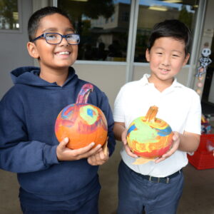 Grade 2 Students Deliver Decorated Pumpkins to Neighbors Photo by Mark Kocina